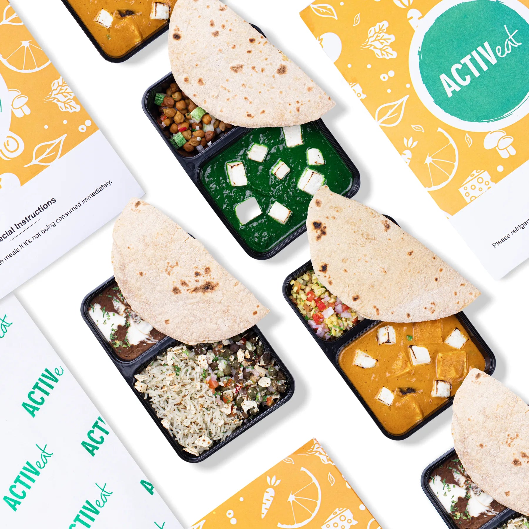 A spread of ACTIVeat meal boxes with the branded sleeves and packaging